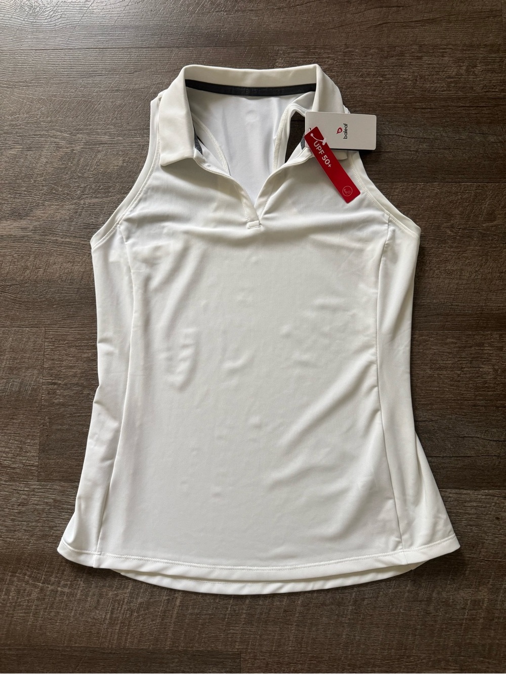 White Sleeveless Golf Polo